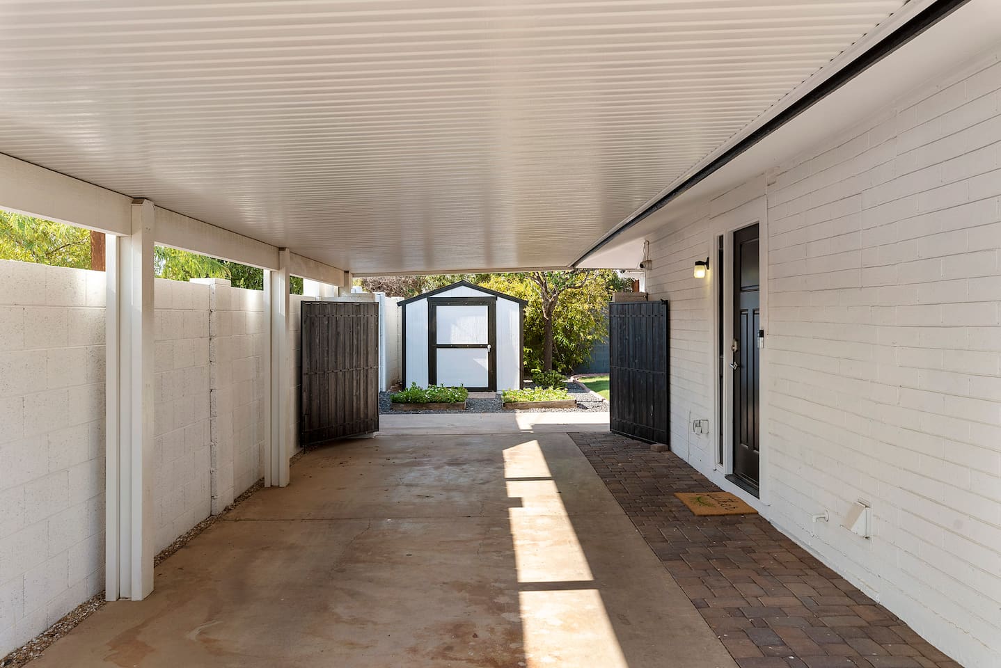 Covered parking for 2 cars. Nicely tucked away from sun and weather.