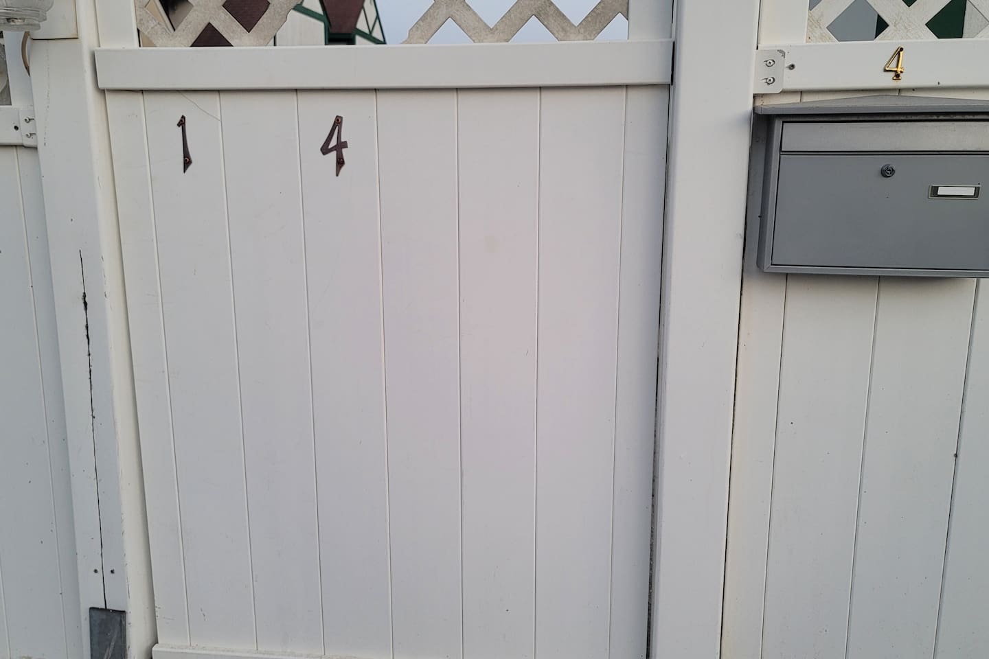 Enter this gate to the property, first house on the right. 