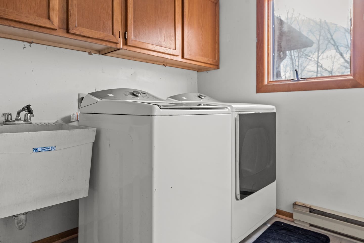 Laundry Room: Bright space with modern appliances—keep your wardrobe fresh during your stay!
