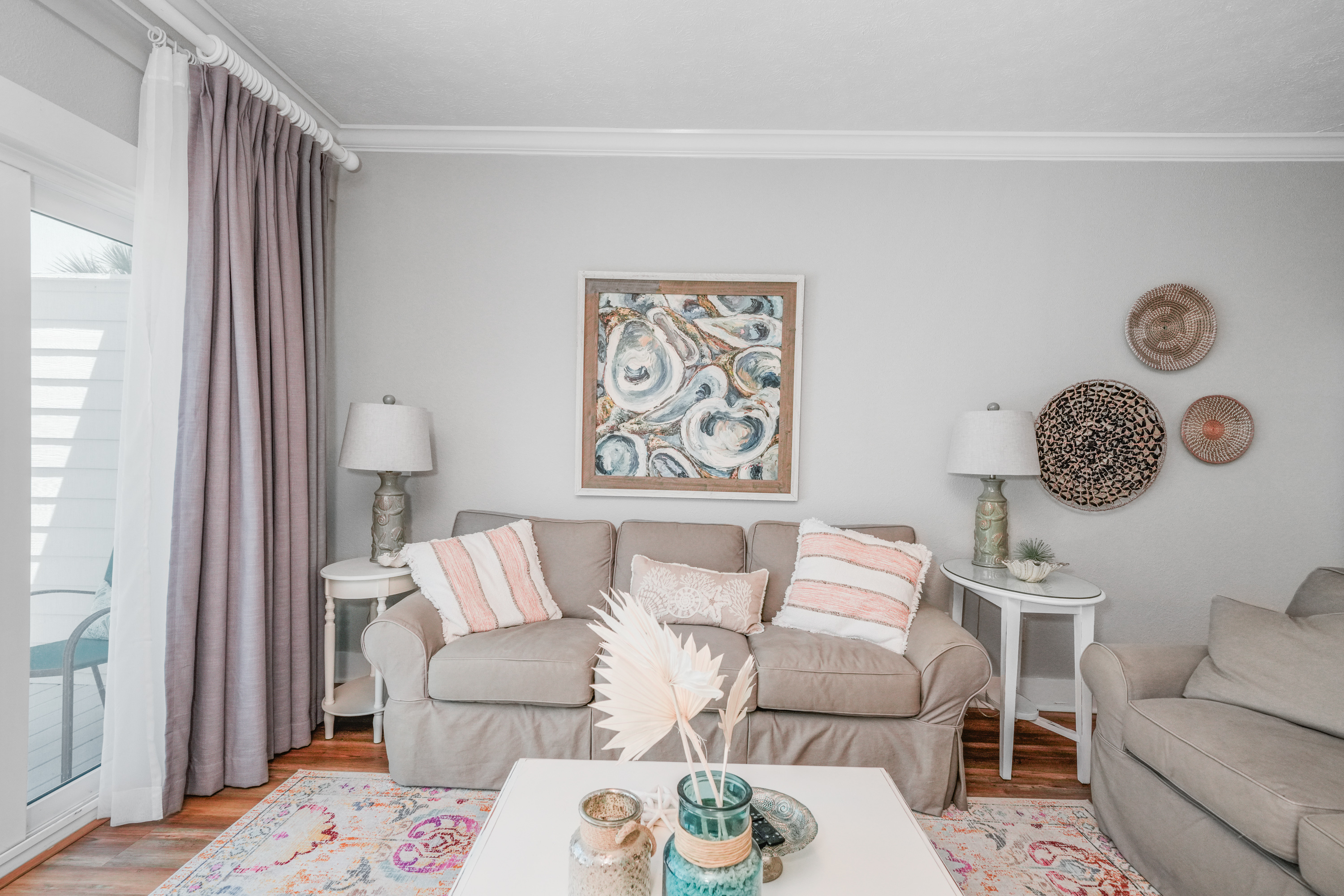 Unwind after a day of adventure in our stylish living room with comfortable seating and thoughtful decoaration