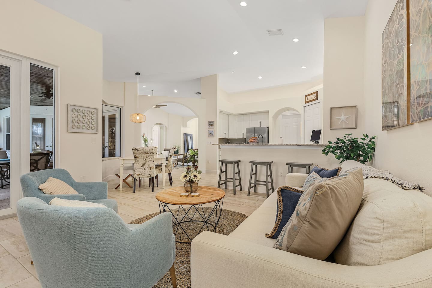 Step into the beautiful family room, opening to the pool and lanai!