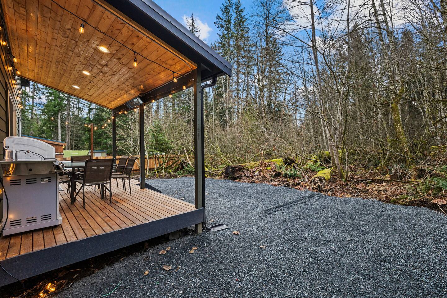 Enjoy old growth and beautiful moss from the back patio. You will encounter plenty of birds, especially blue jays that live among the trees in the backyard