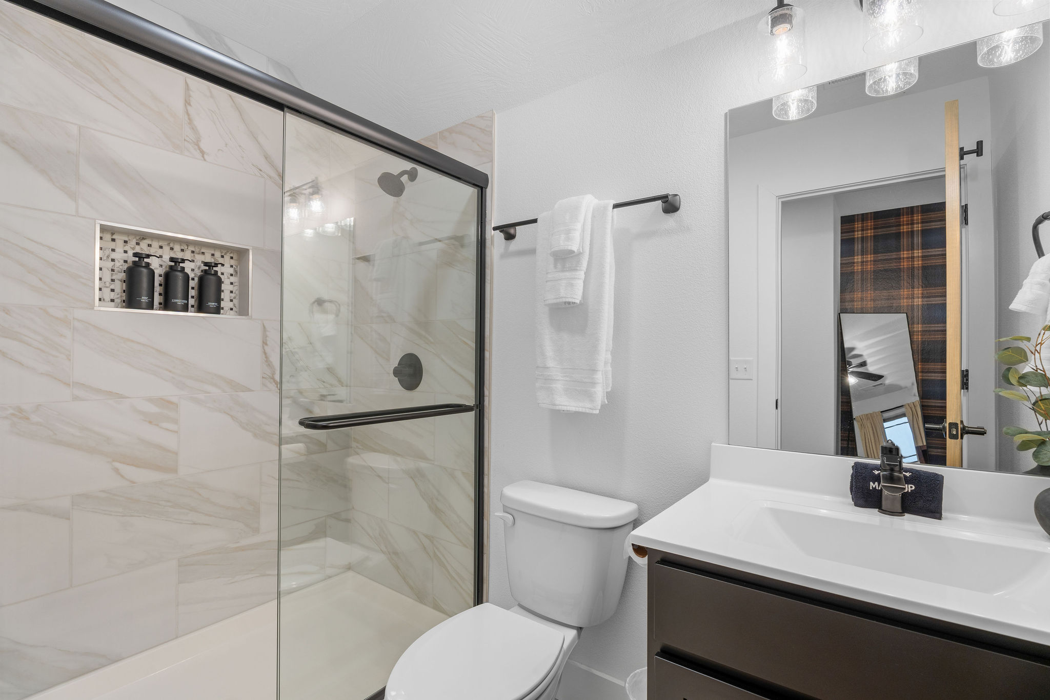 Clean, modern bathroom with a spacious walk-in shower.