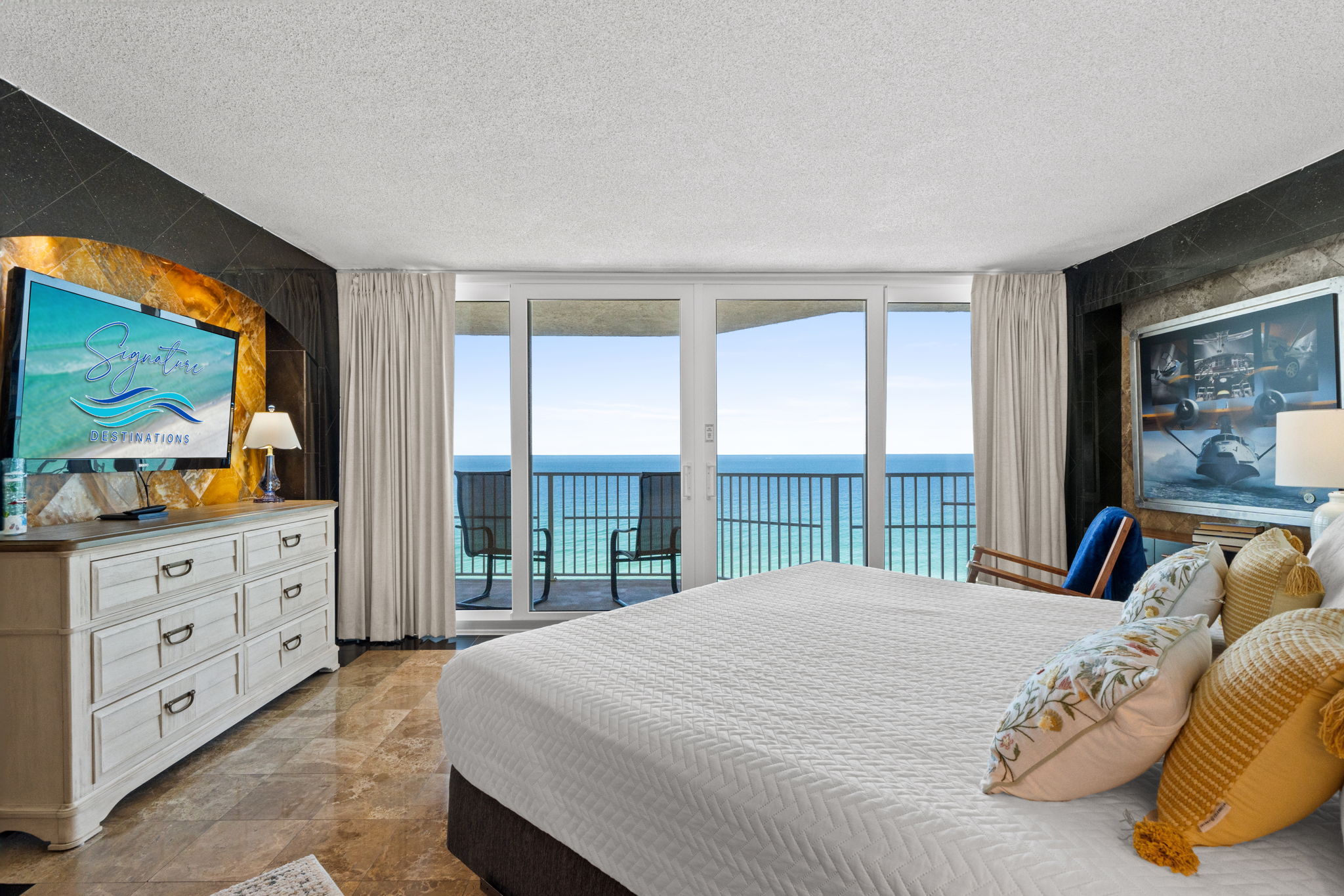 Master bedroom with king bed and beach views