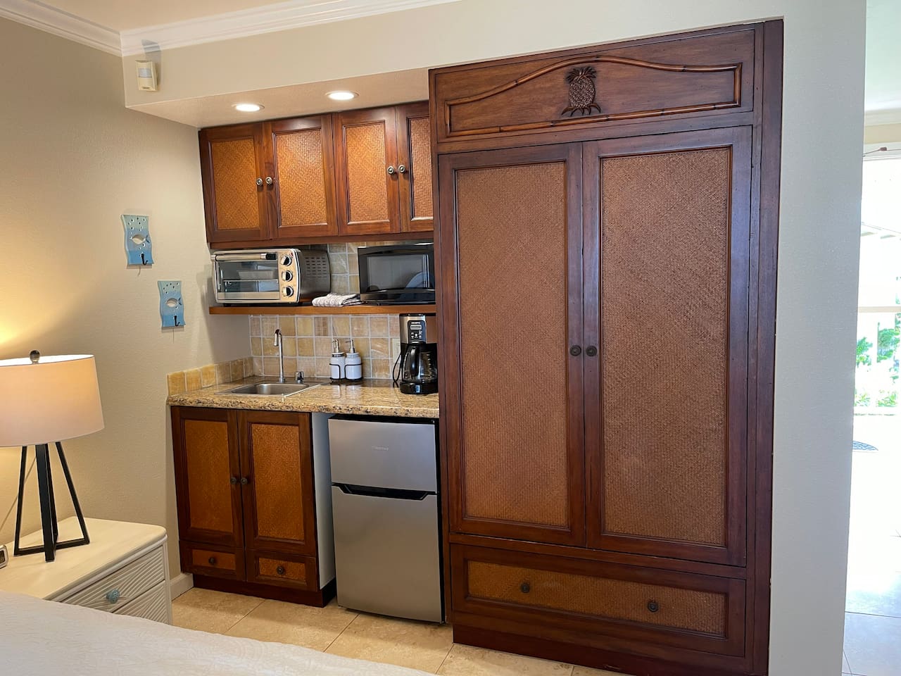Kitchenette includes microwave, toaster oven, mini fridge and coffee maker.