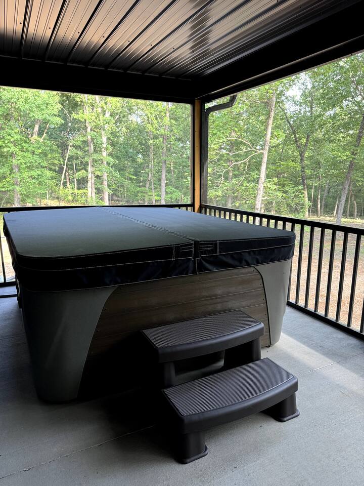 The hot tub cover has clasps that lock in place for safety and steps to assist you in getting in the hot tub. 