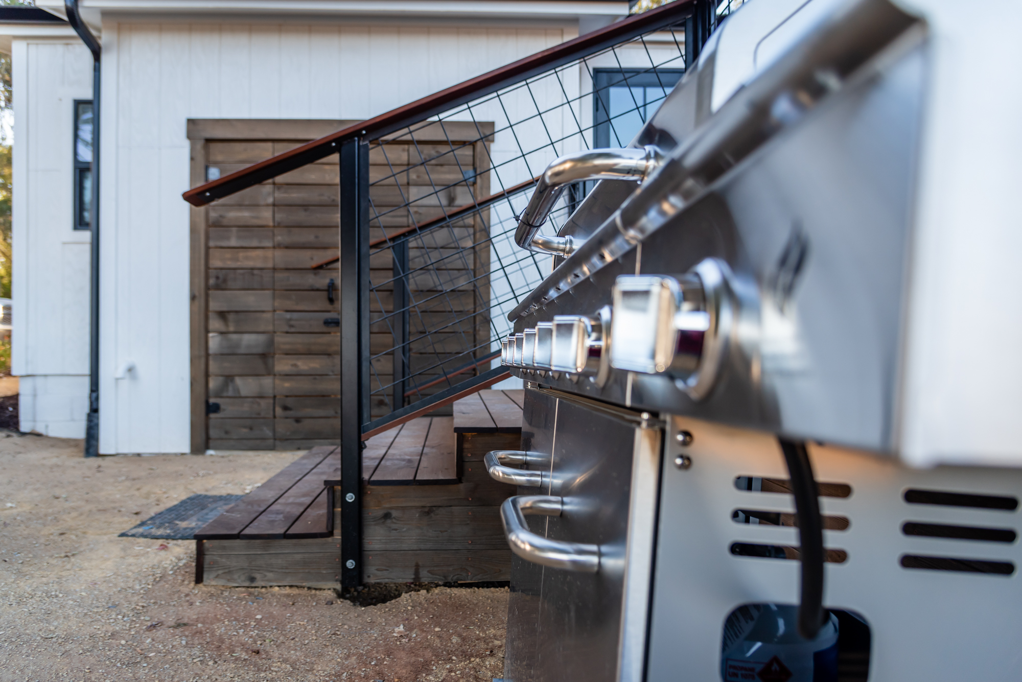 Fire up the stainless steel grill for an outdoor dinner.