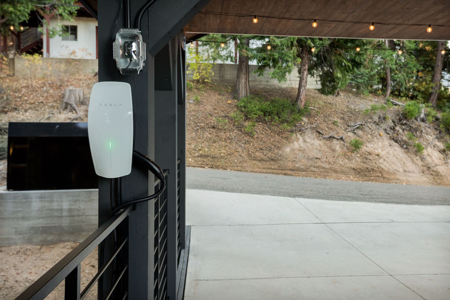Tesla Magic Dock EV charger has built-in adapters for both Tesla and non-Tesla plug types.