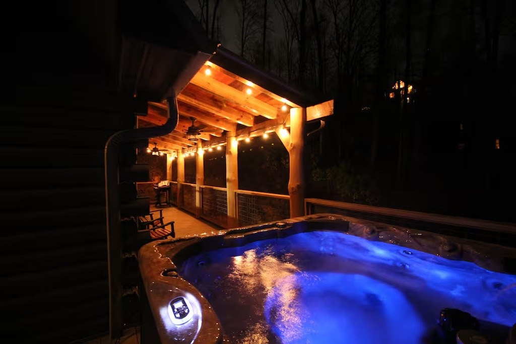 After the kids are tucked in, the hot tub at Bear Paws Cabin becomes the ultimate adult retreat. Glowing blue jets, warm string lights overhead, and the quiet sounds of a Gatlinburg mountain night &mdash; this is what a real family vacation feels like.