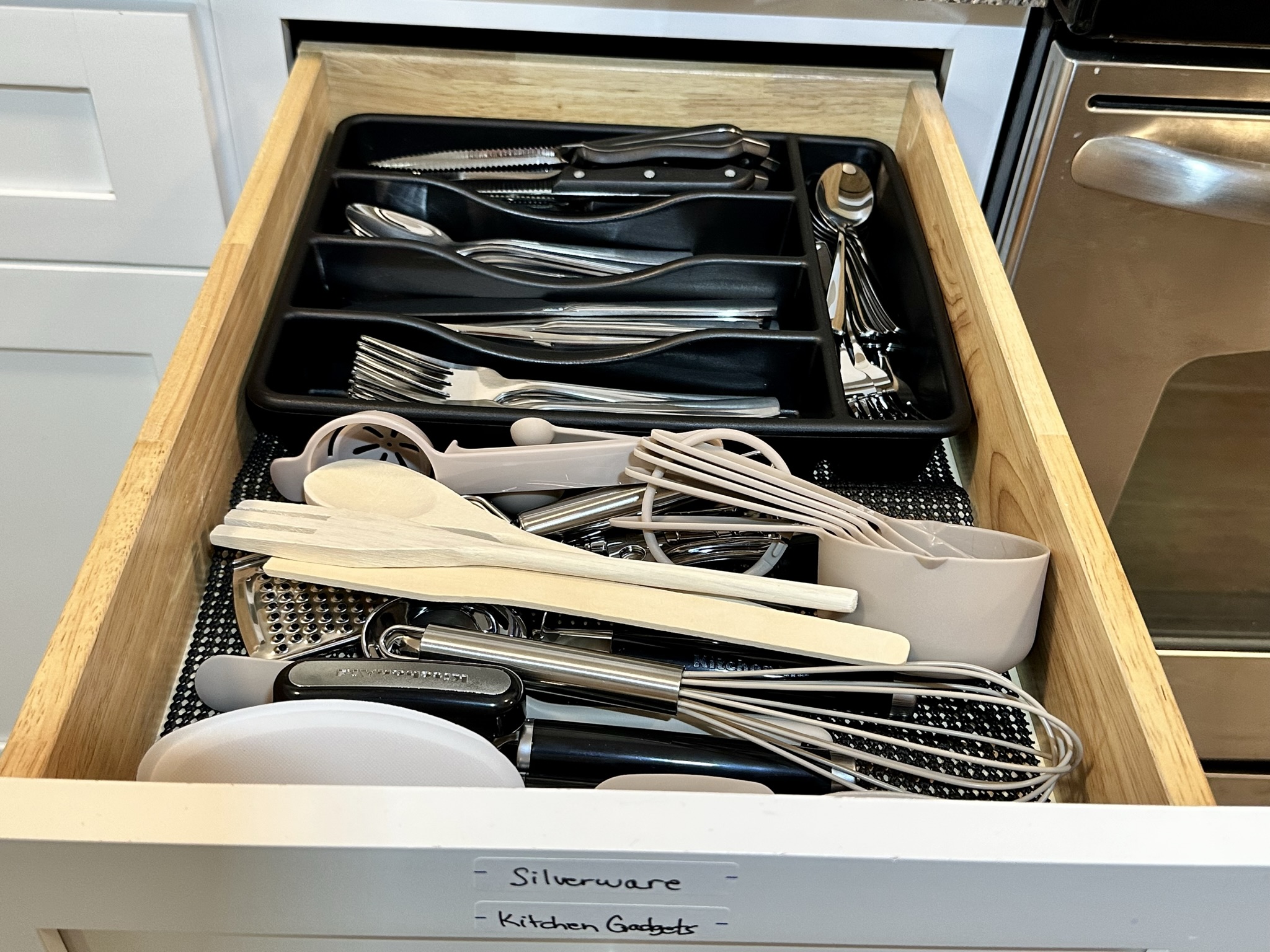Plenty of silverware and essential kitchen gadgets