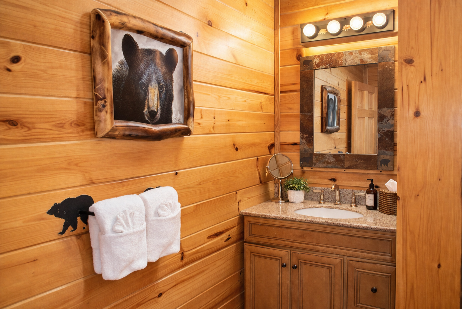Full bathroom on the main level just off of Bedroom 1.