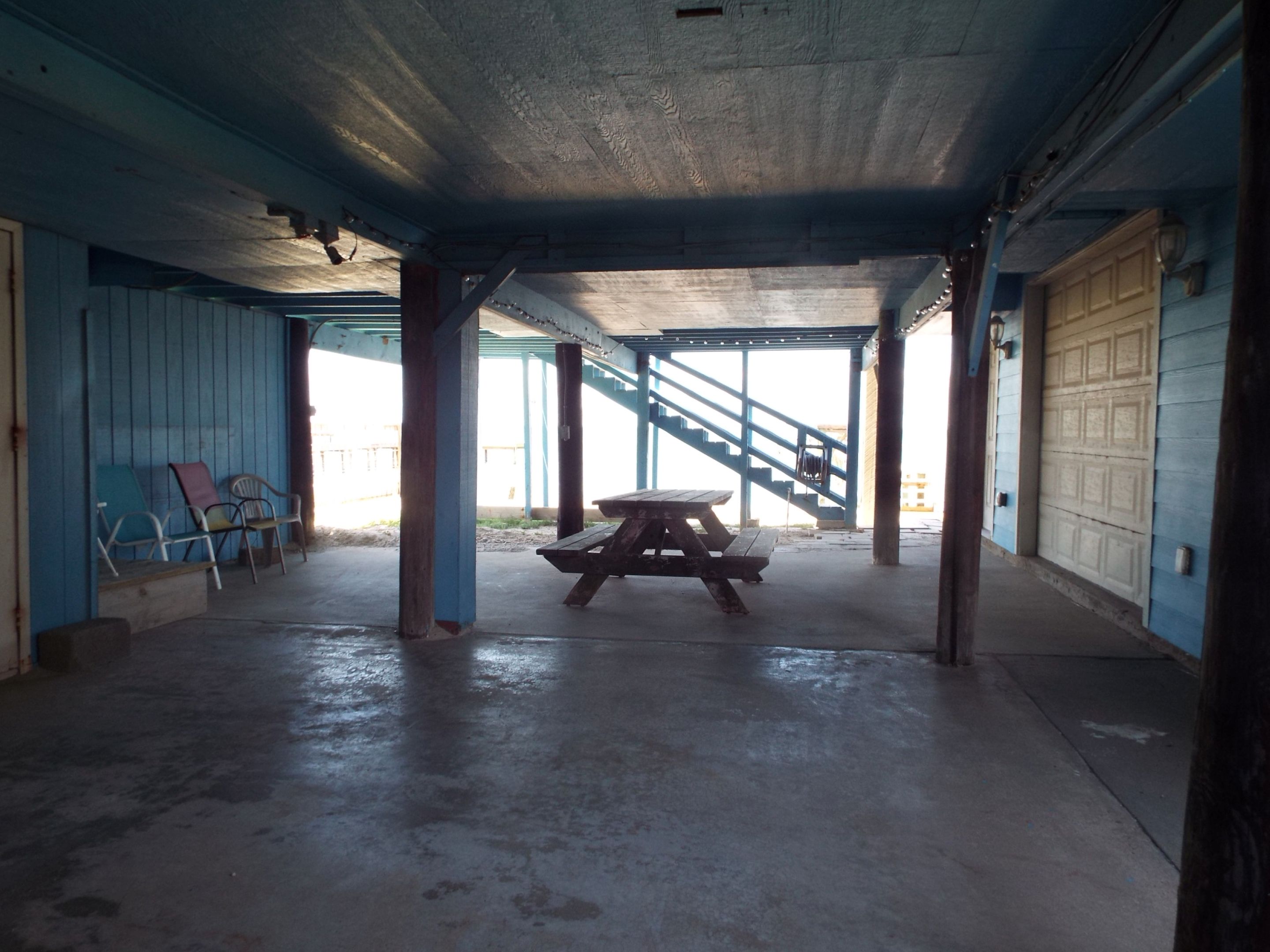 Downstairs covered space, great for relaxing in the shade!