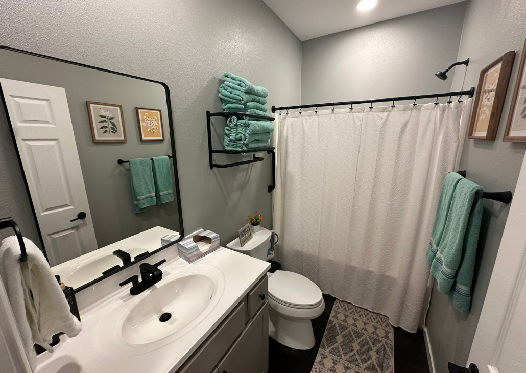 Bathroom 1 with tub/shower combo.