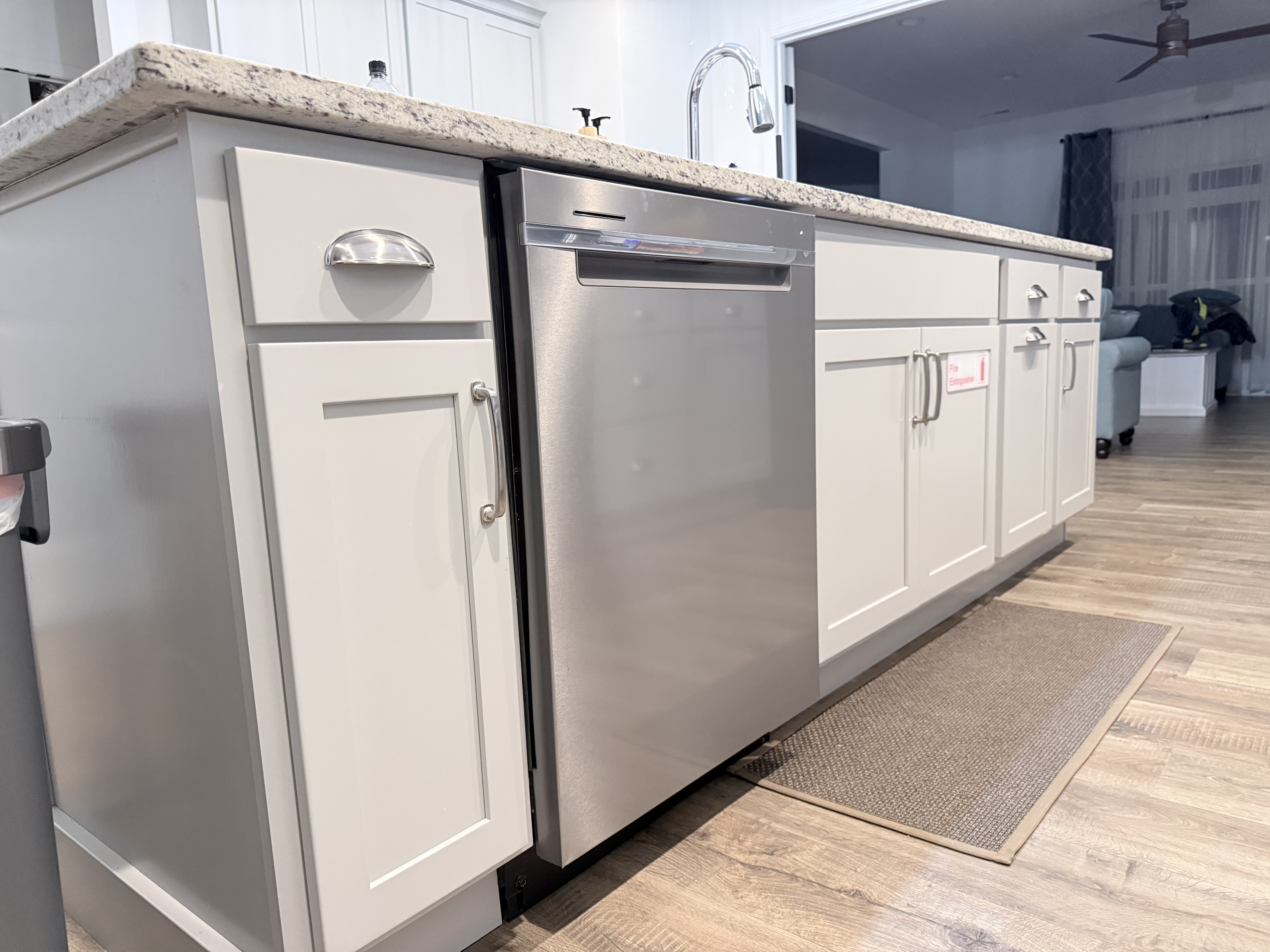 dishwasher and sink located in island