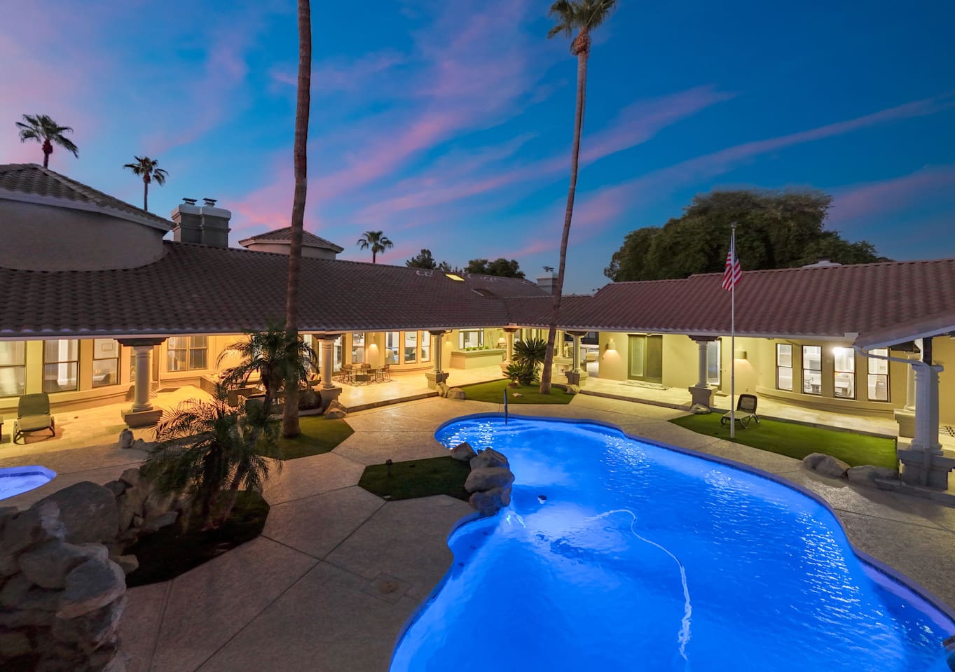 The peaceful ambiance of this beautifully lit pool invites evening dips and starry-sky lounging.

