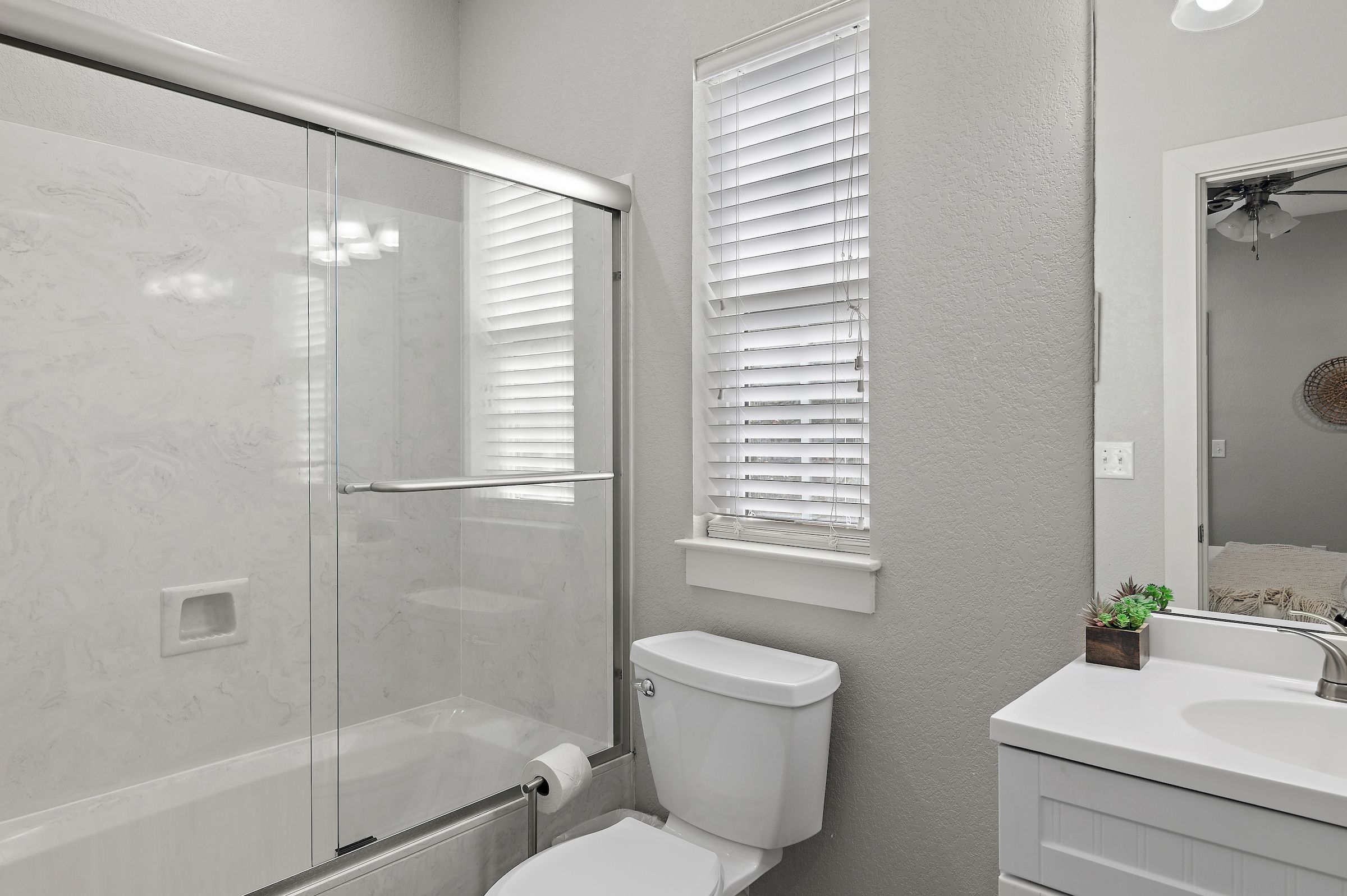 Bathroom #4: Private attached bathroom with shower/tub combo