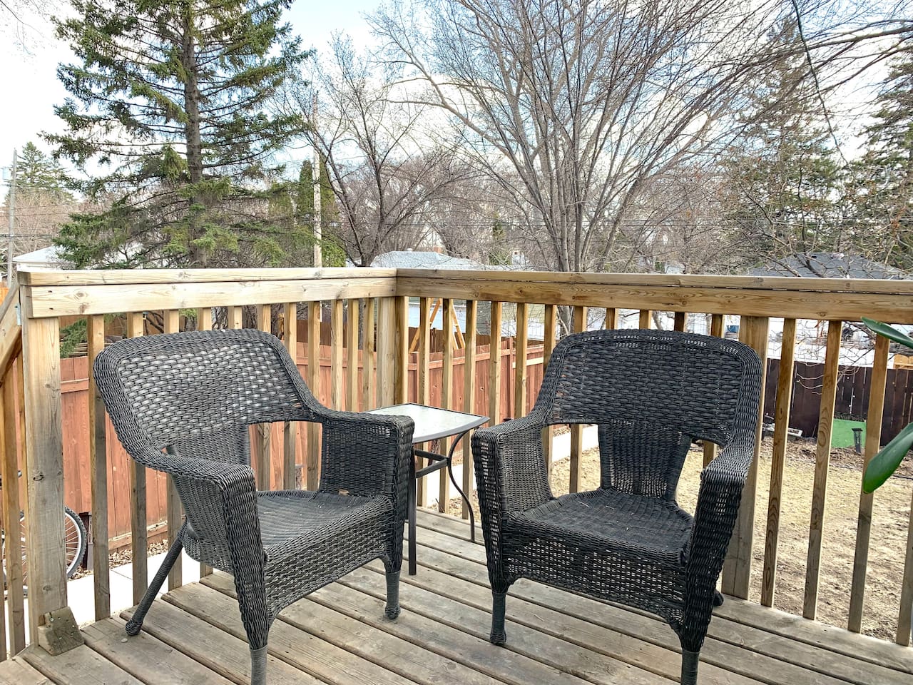 Two-seat deck setup for morning coffee or quiet evenings