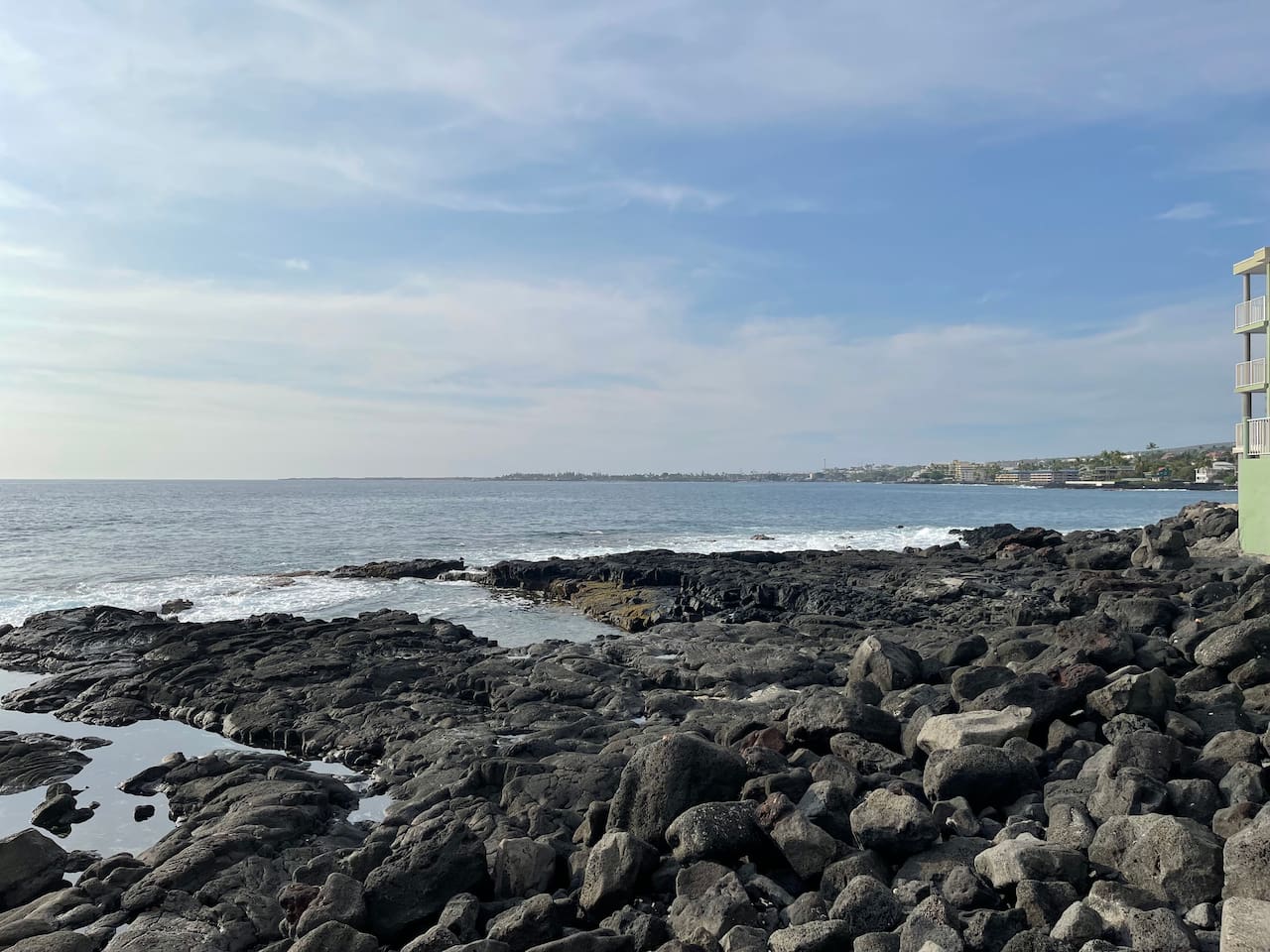 Dramatic Kona coastline just steps away — enjoy stunning sunsets and the soothing sound of the waves.