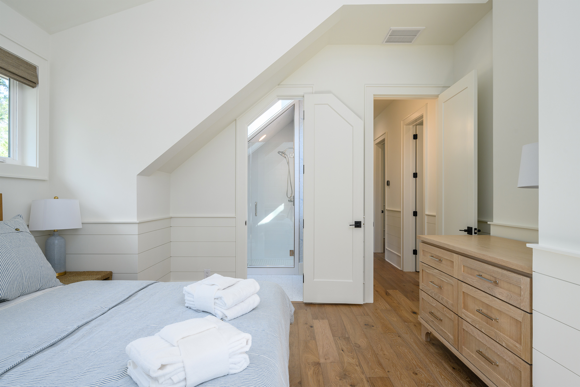 Upstairs conrer bedroom view to private bath and all and den