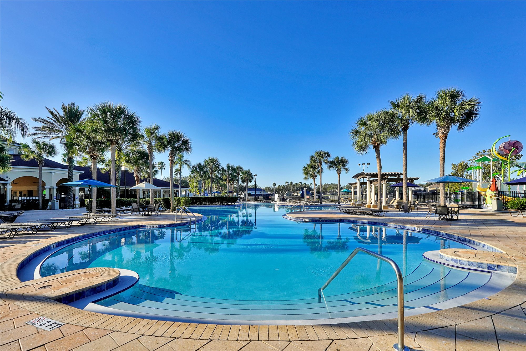 Relaxing areas all around pool