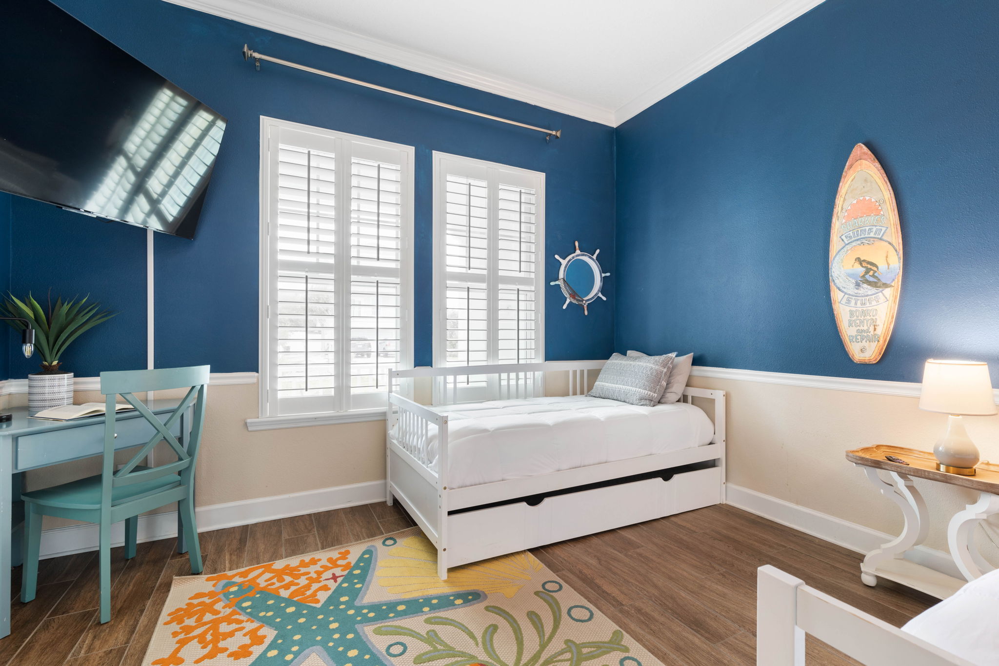 After sandy afternoons and salty hair, this surf-inspired room gives everyone a cozy place to unwind—storybook nights, morning cartoons, and that happy little feeling of being tucked into your own beach hideaway.