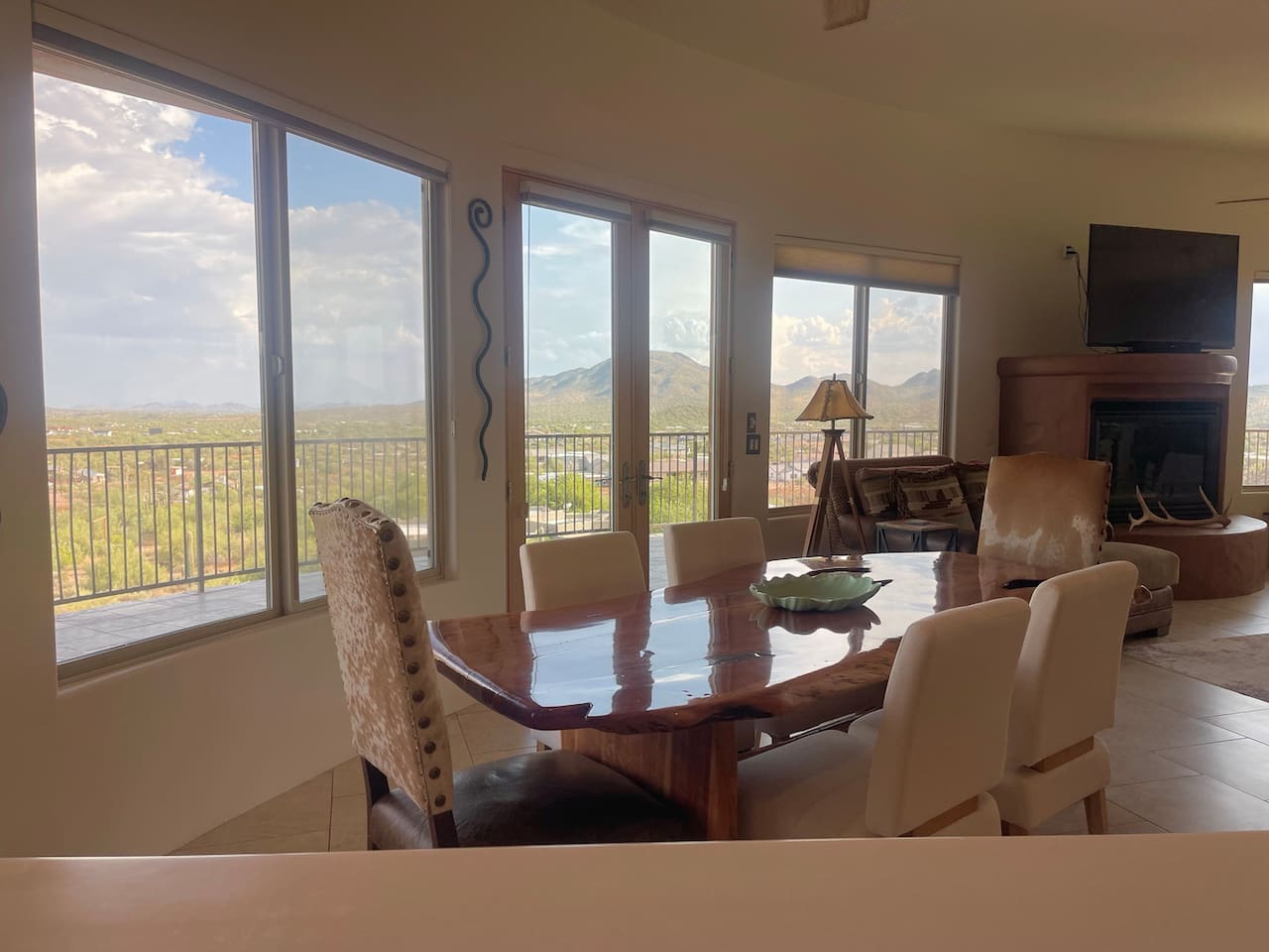 Window-lined dining area keeps the scenery in view while you sit down for a meal.