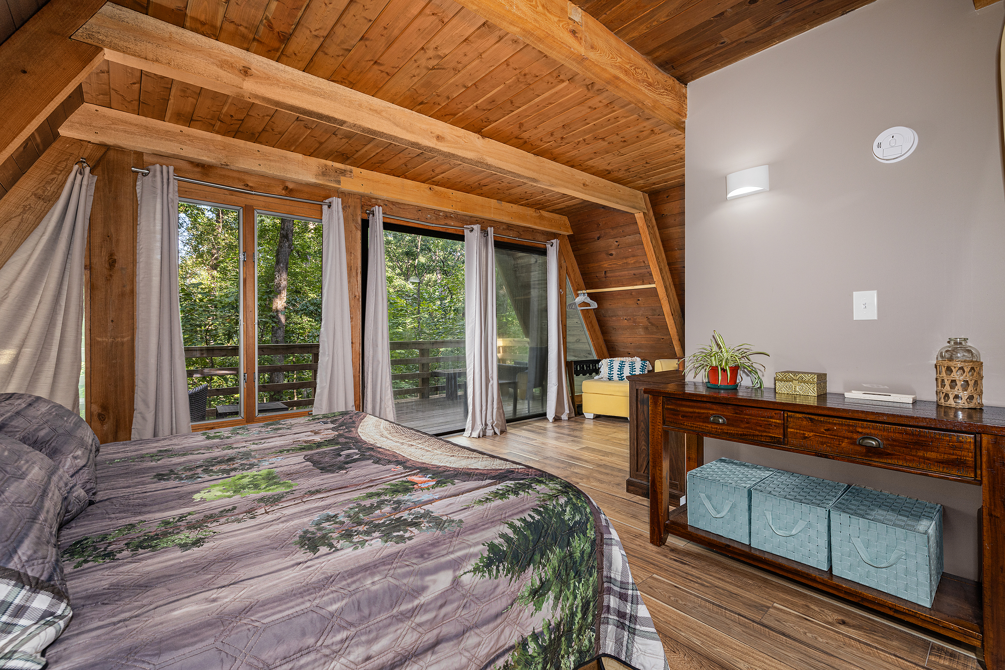 Easily access the balcony from the first-floor sleeping space.