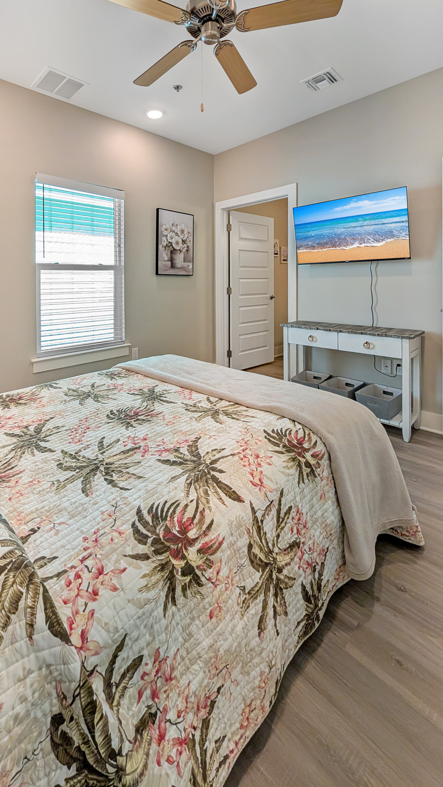 Master suite with queen bed and smart tv