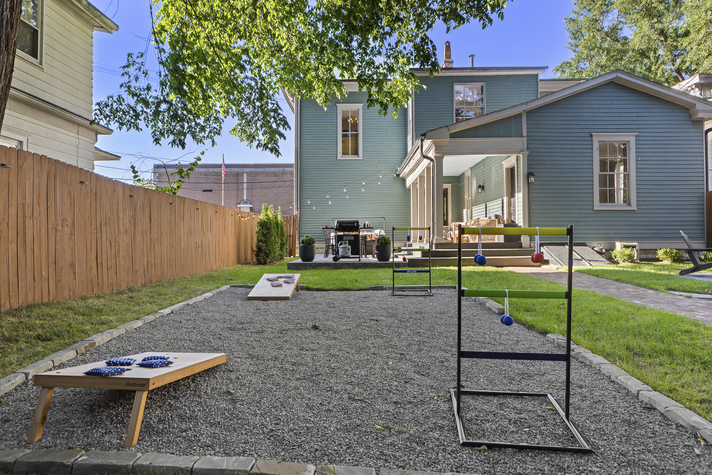 Cornhole, ladder toss, and plenty of room to roam make it easy to keep the competition going before gathering around the fire pit.