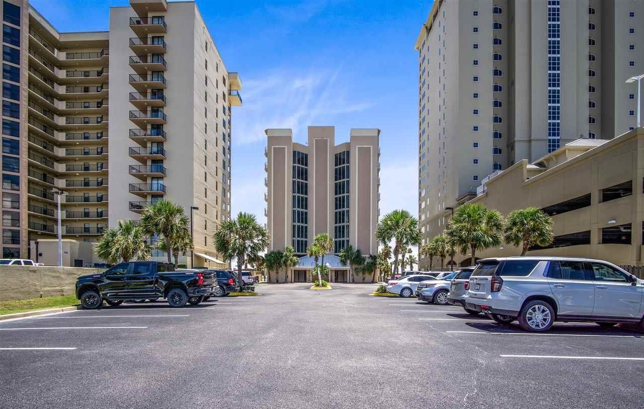 This prominent beachfront building stands as a testament to coastal architecture, providing residents and guests with an unparalleled seaside experience.