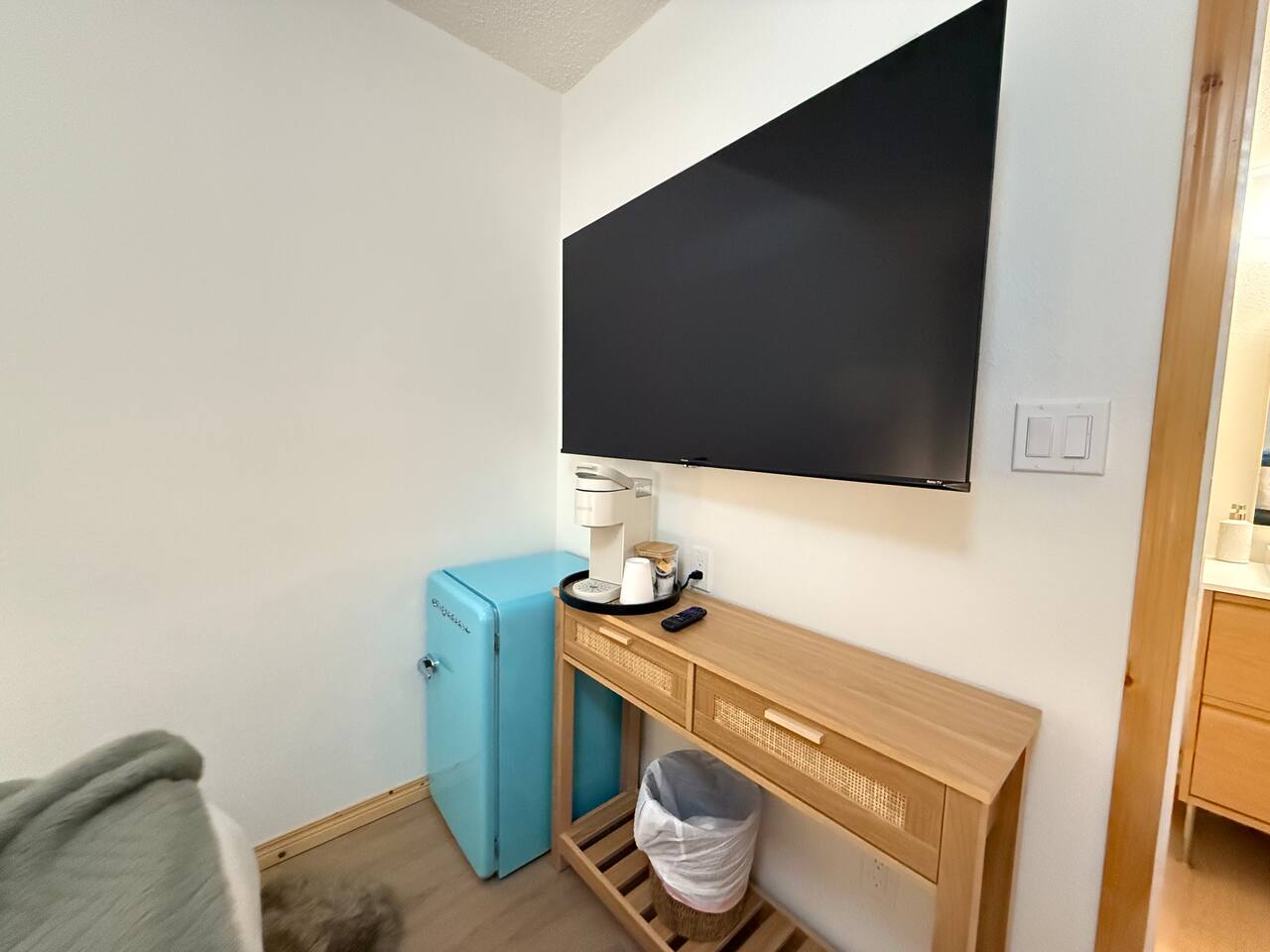 58” smart TV ready for you to streaming platform and watch your shows. A Keurig to brew morning coffee and a mini-fridge for your use.