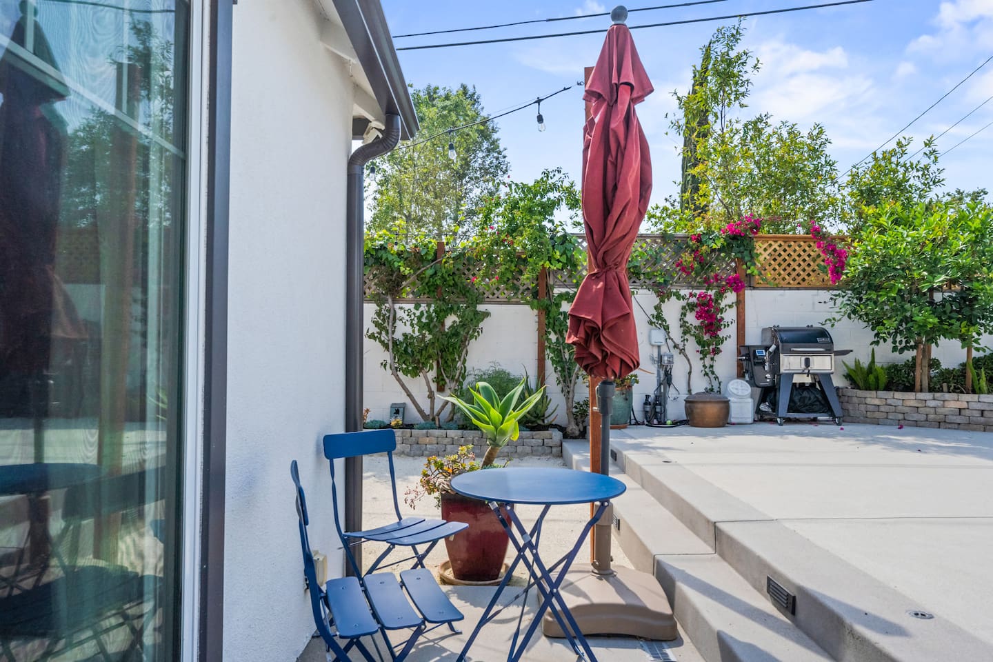 Sun-drenched relaxation meets cozy charm—your perfect outdoor escape.