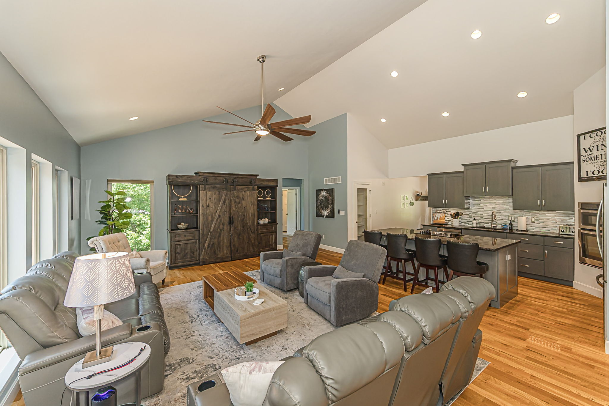 Relax together with soaring ceilings and an open-concept layout.