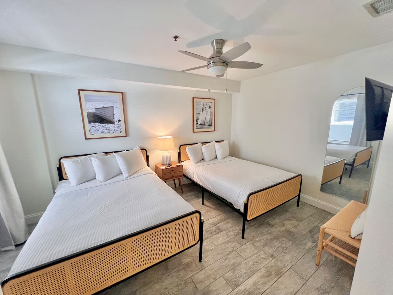 2 full size beds and a smart TV that swivels on the wall for best angle 