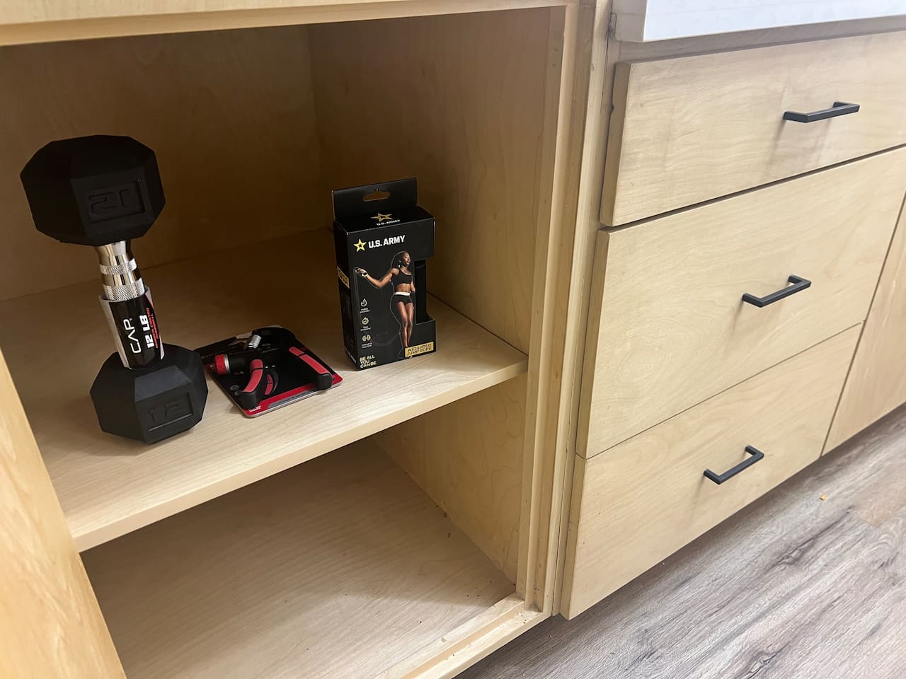 Small workout items and drawer storage available for guest use.

