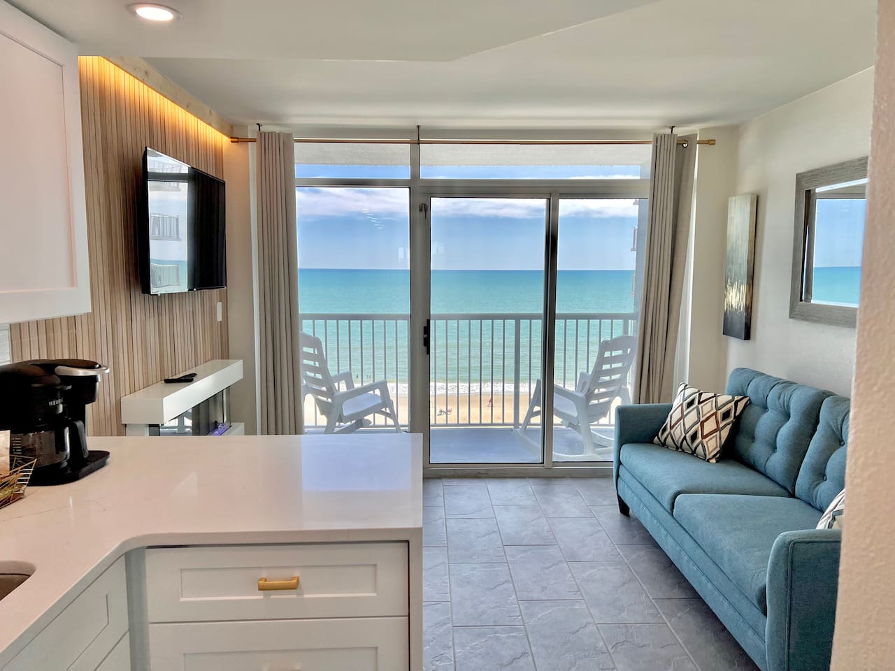 Living Room off the Kitchen with Private Balcony Access