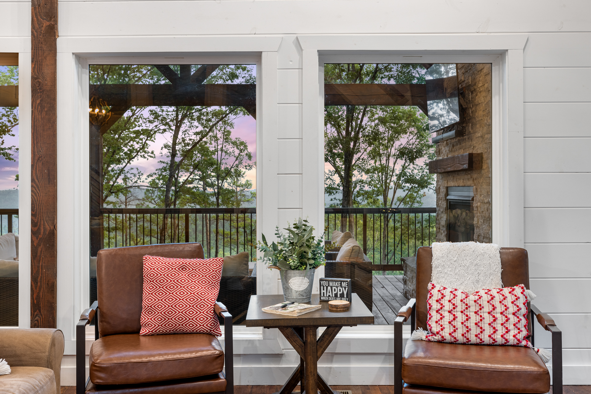 Cozy sitting nook with peaceful forest views and inviting natural light