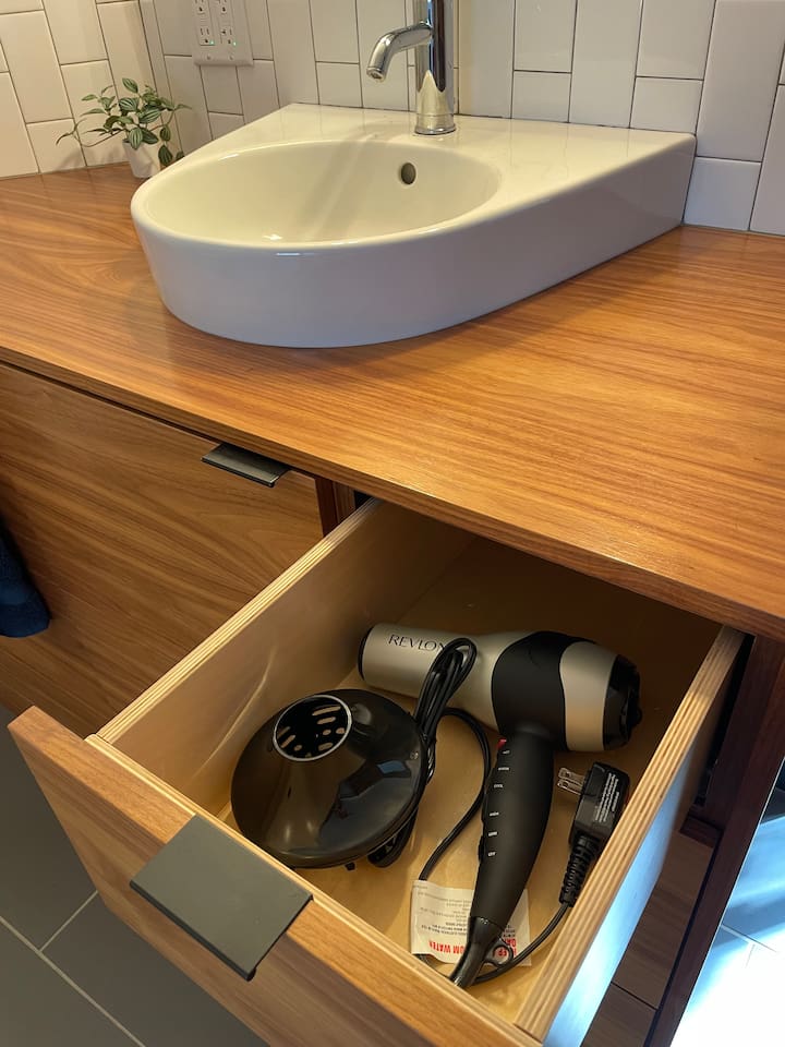 Freshen up with ease — our guest bathrooms are fully stocked so you can travel lighter and feel cared for.
