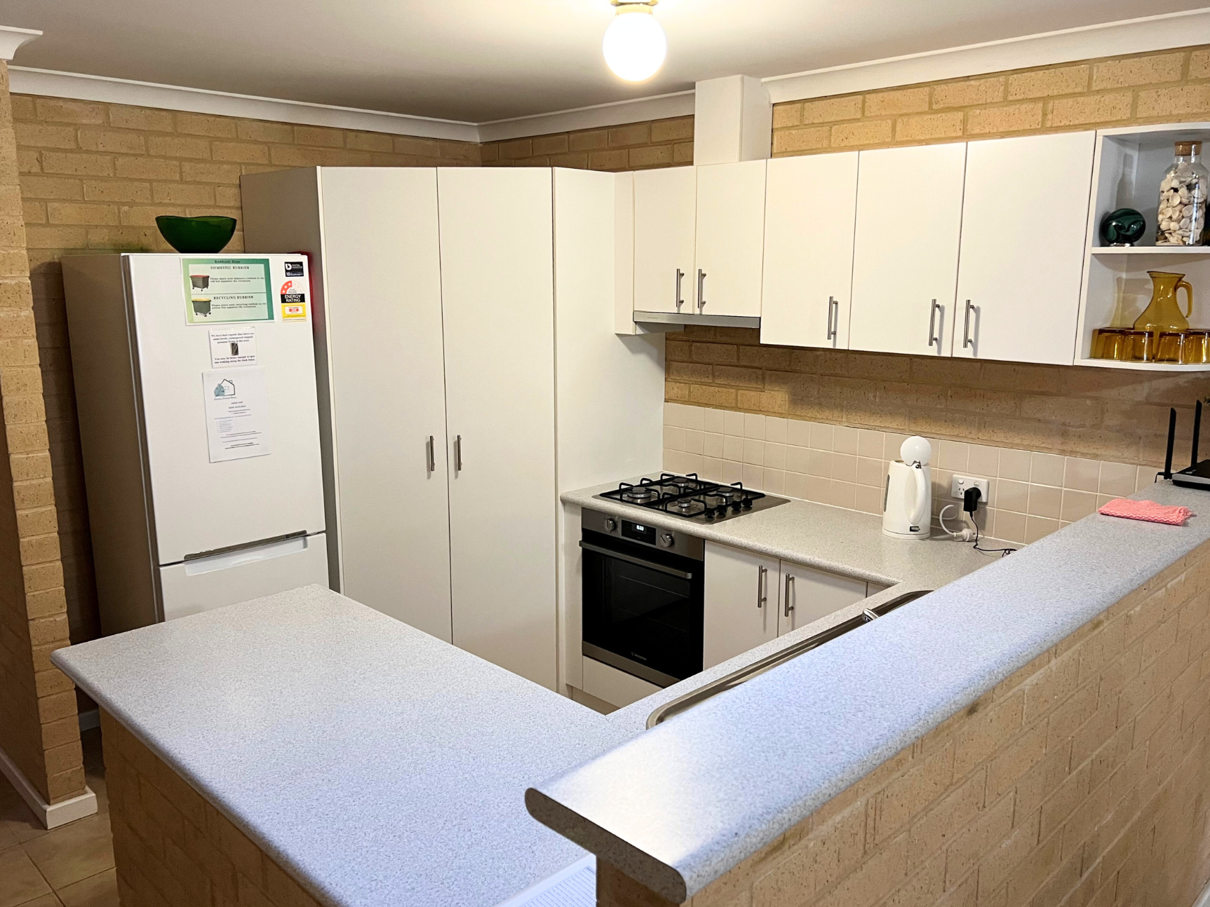 Lovely modern kitchen with coffee pod machine & underbench microwave