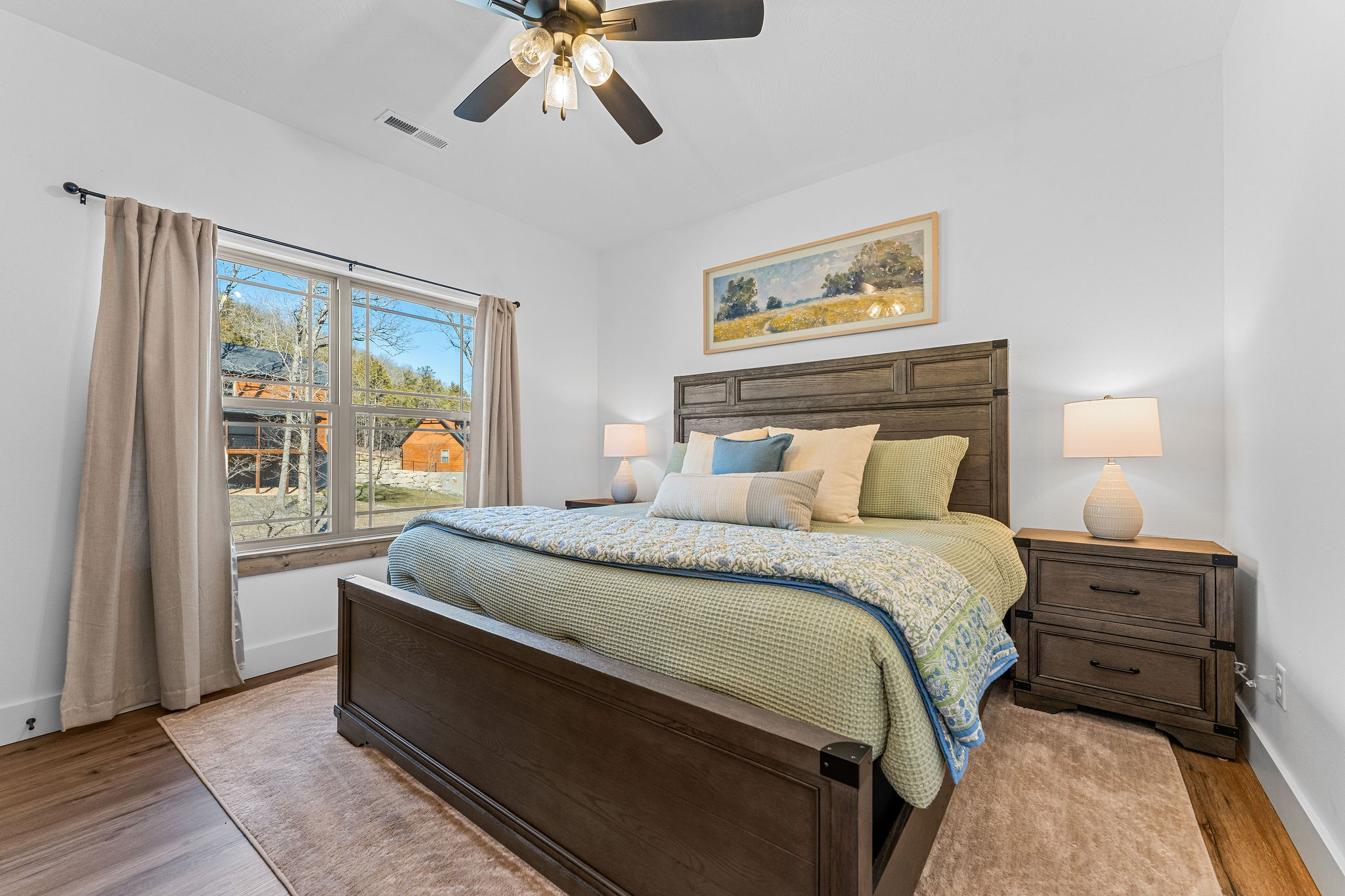 Peaceful bedroom number four with soft lighting and a calm, inviting feel.