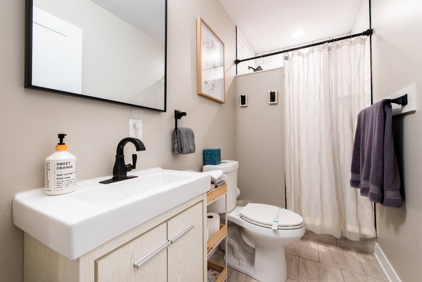 Ensuite full bathroom for primary bedroom.