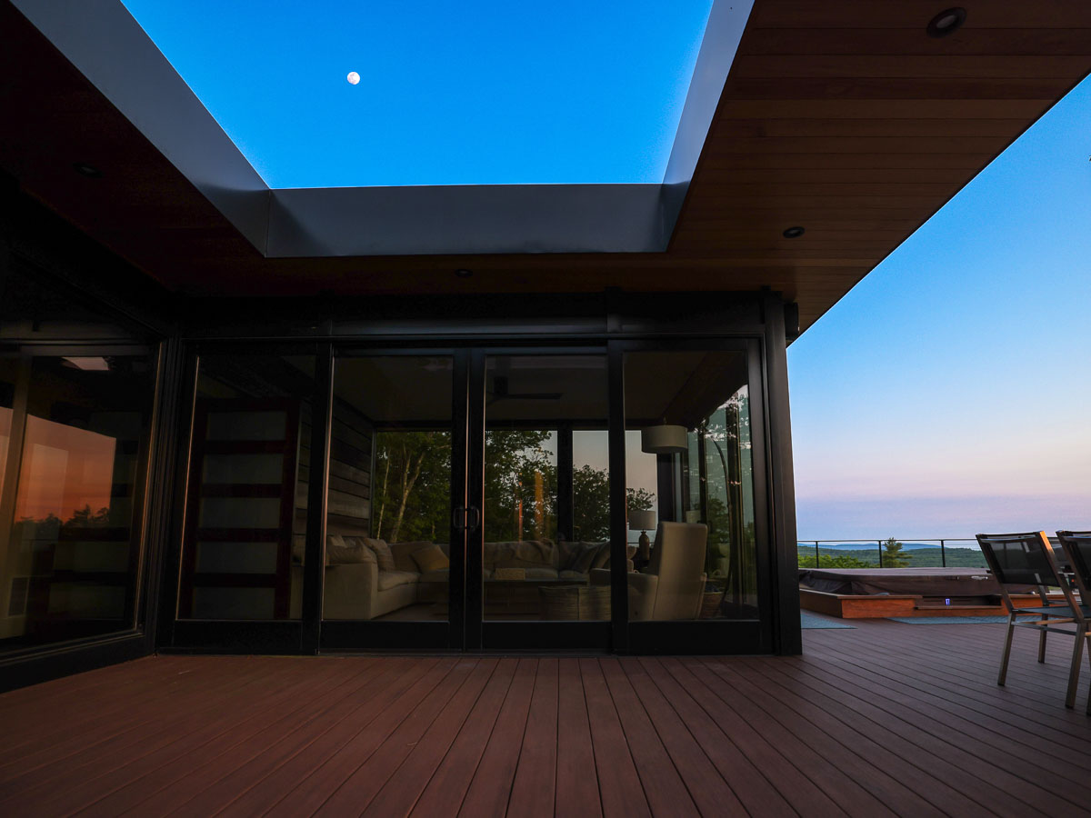 Deck at dusk with rising moon and evening sky &mdash; Sunset Falls Berkshires