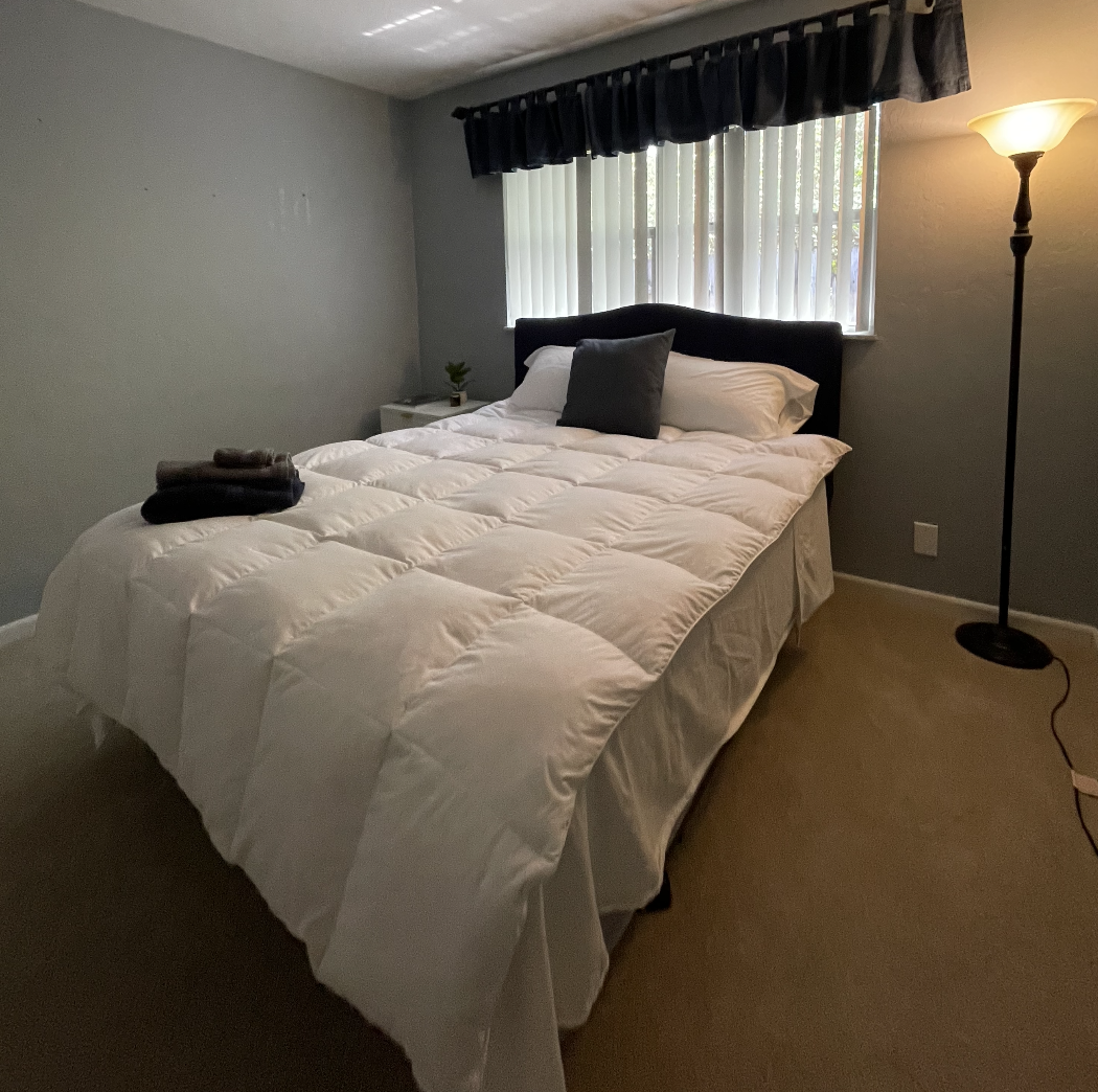 Our second bedroom is comfortable with plenty of closet space.