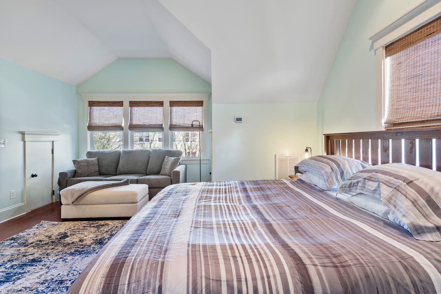 Queen bed with fresh linens — quiet, restful, and ready for a great night's sleep