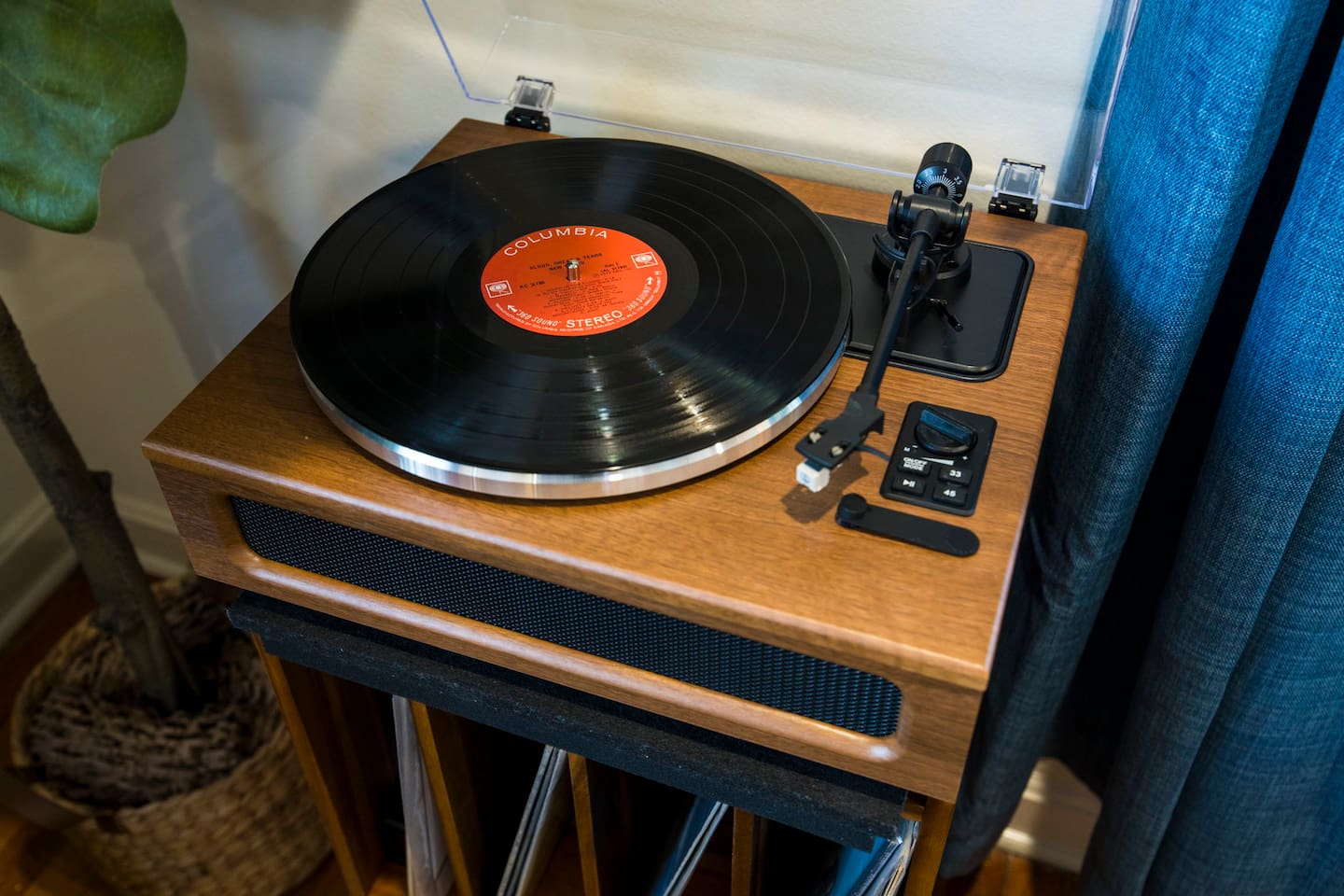 Enjoy the vintage charm of our turntable, complete with a curated collection of albums for nearly any mood.