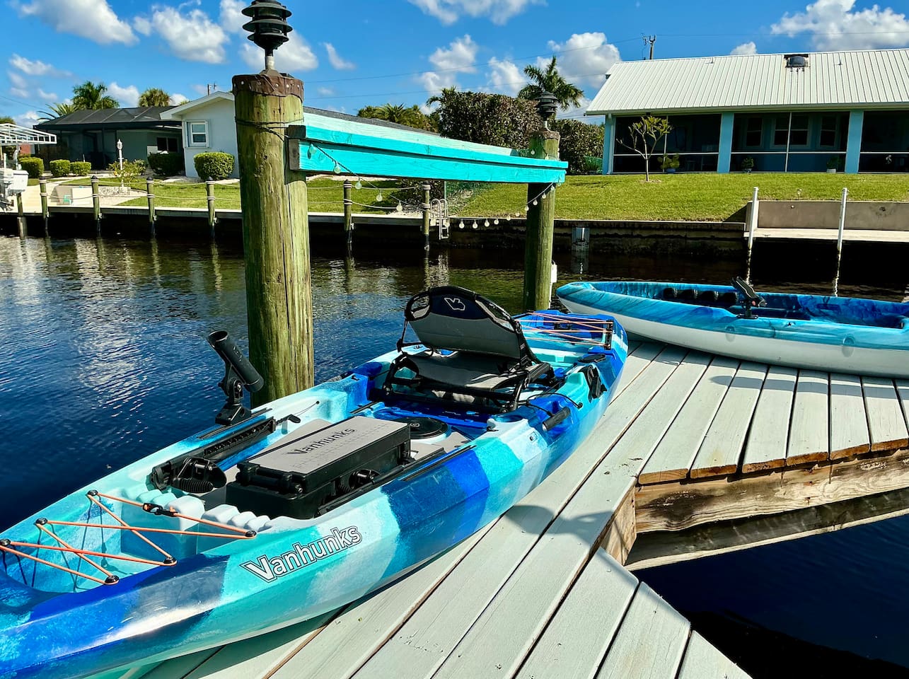 Two newly purchased fishing kayaks outfitted for fishing on the Caloosahatchee River