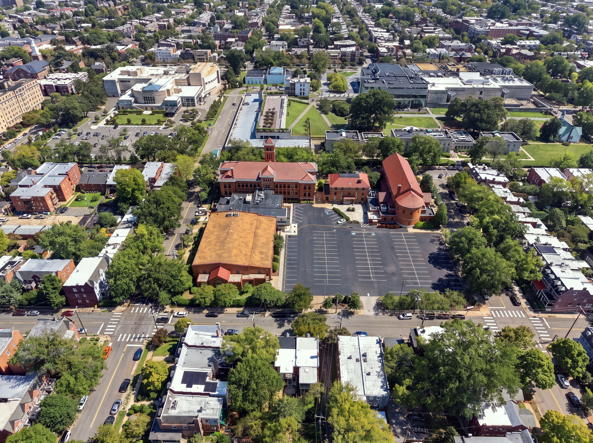 Neighborhood View: Discover vibrant Richmond from above, surrounded by lush greenery and historic charm!
