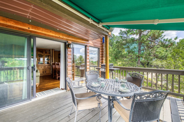 Sit back and relax in the shaded comfort of the patio, with tables and chairs that overlook breathtaking nature views for a truly peaceful experience