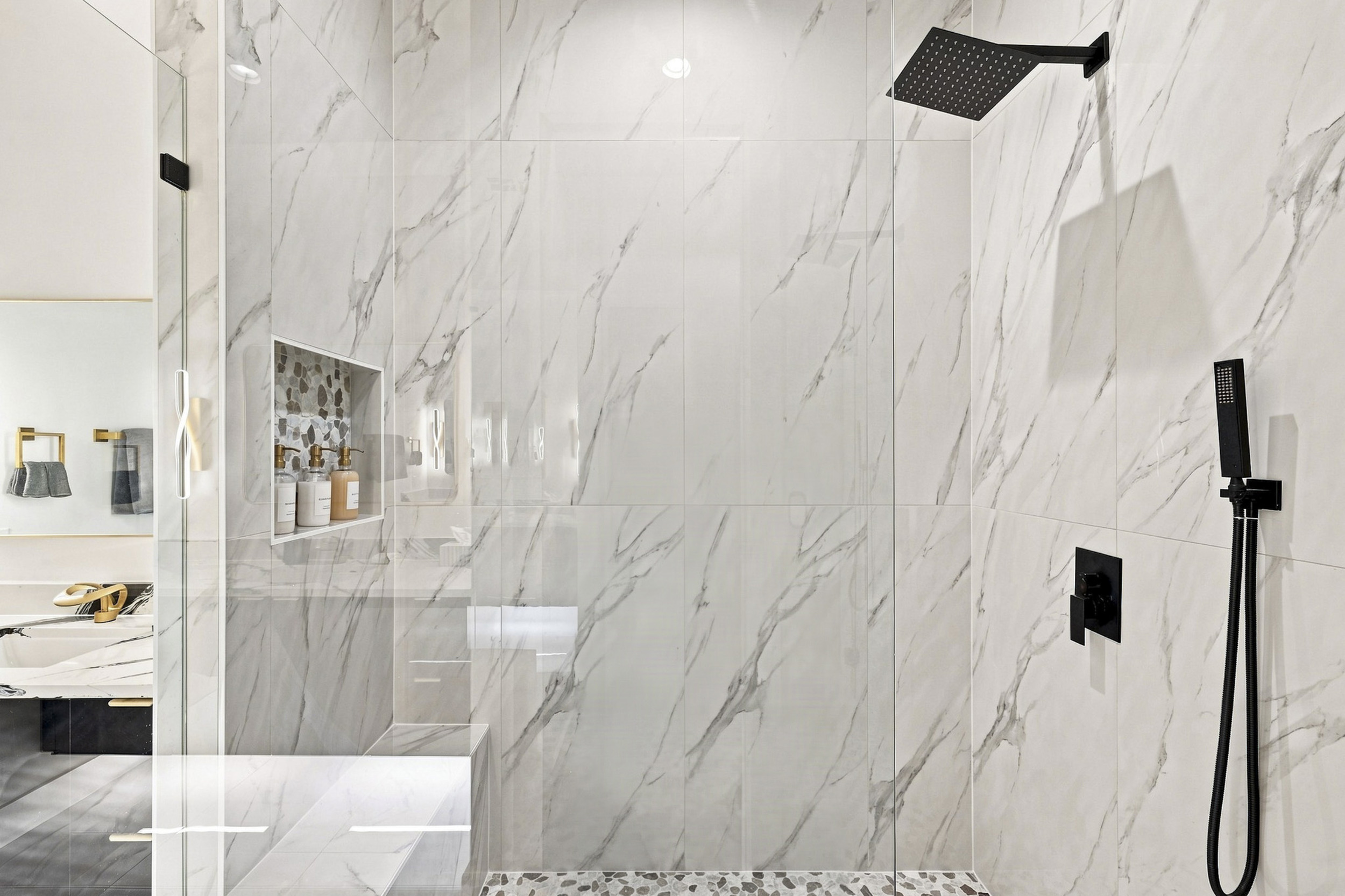 Experience modern elegance with a stunning rain shower and stylish finishes!