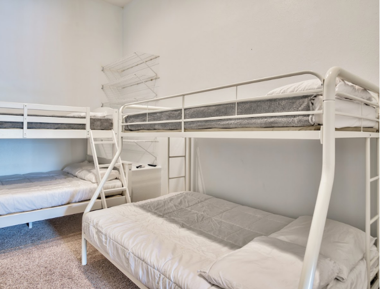 Bunk area with two twin-over-full bunk beds